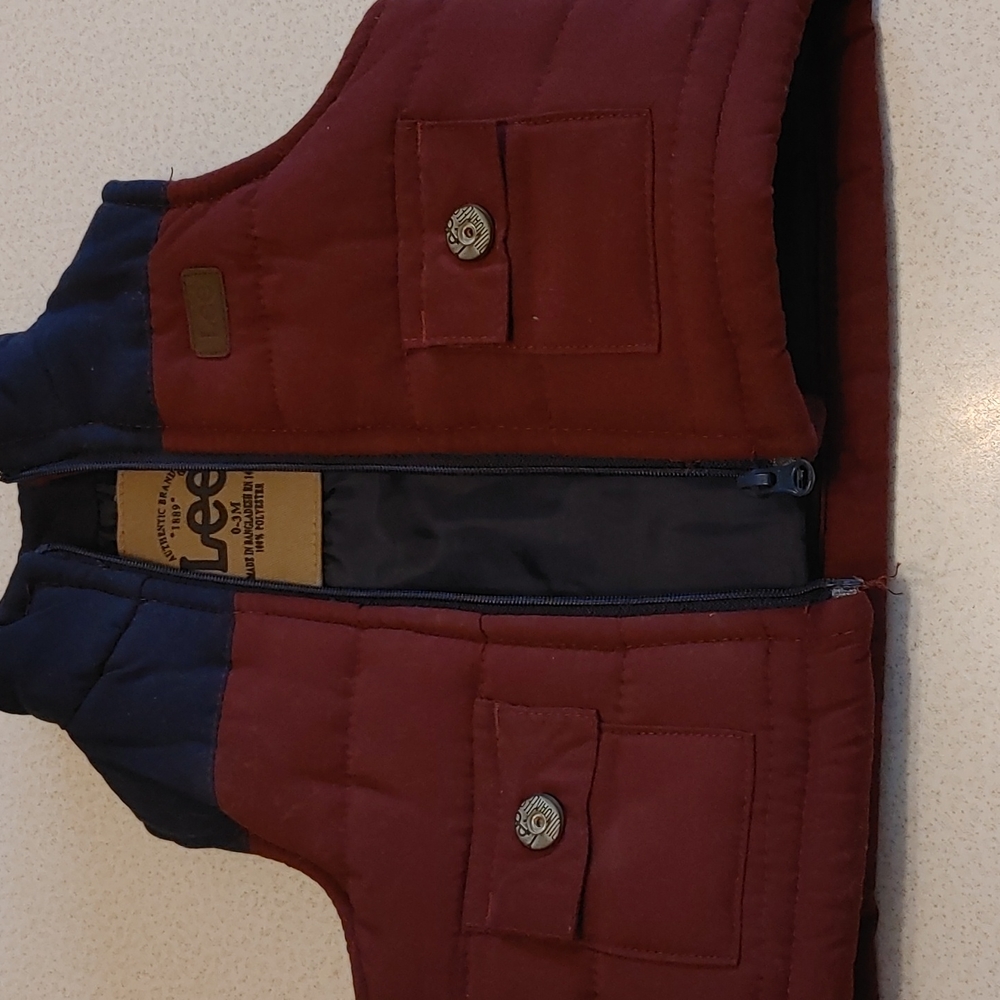 COPY - 0-3 mo. polyester vest in perfect condition.